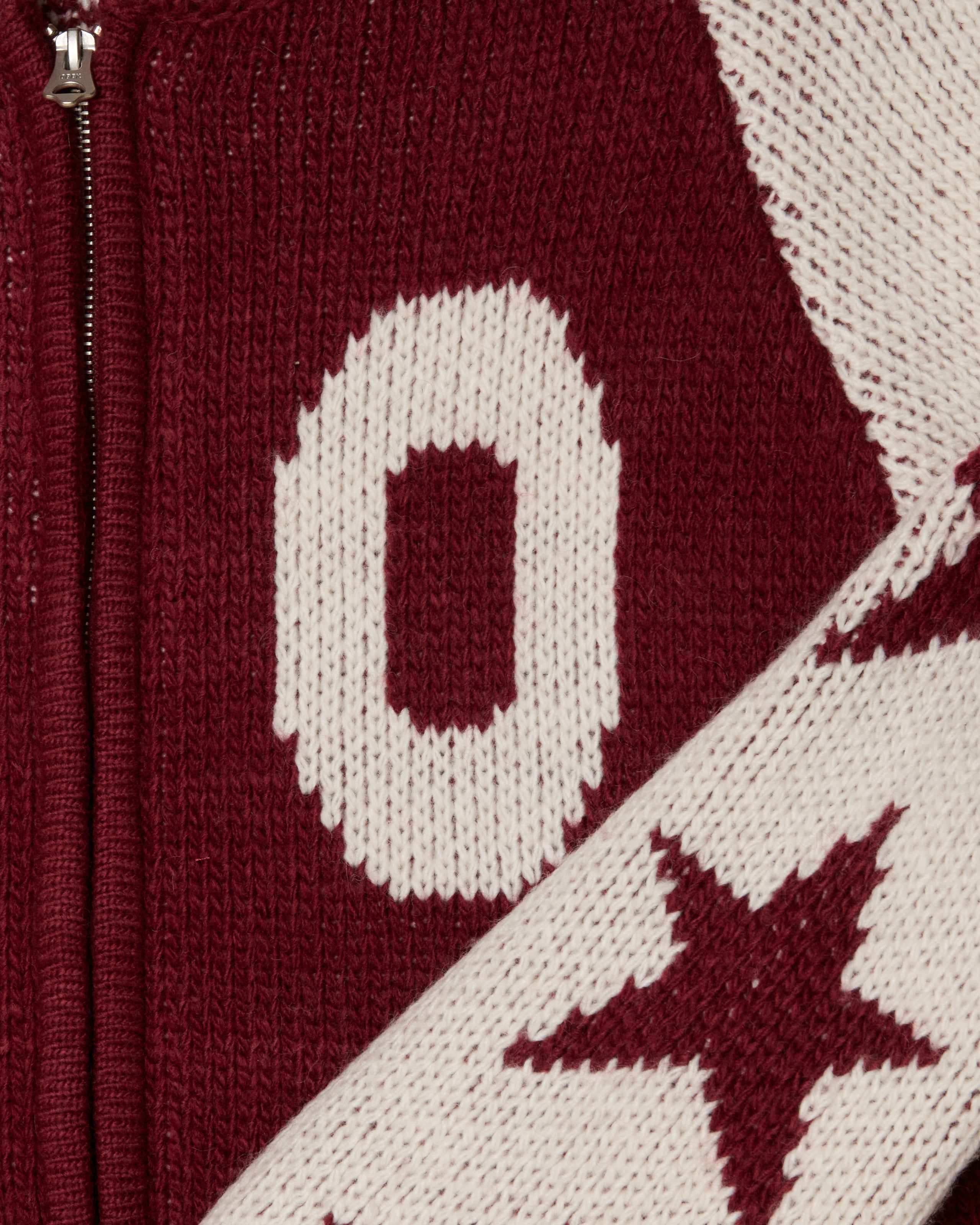 INT. COWICHAN SWEATER (zoomed)