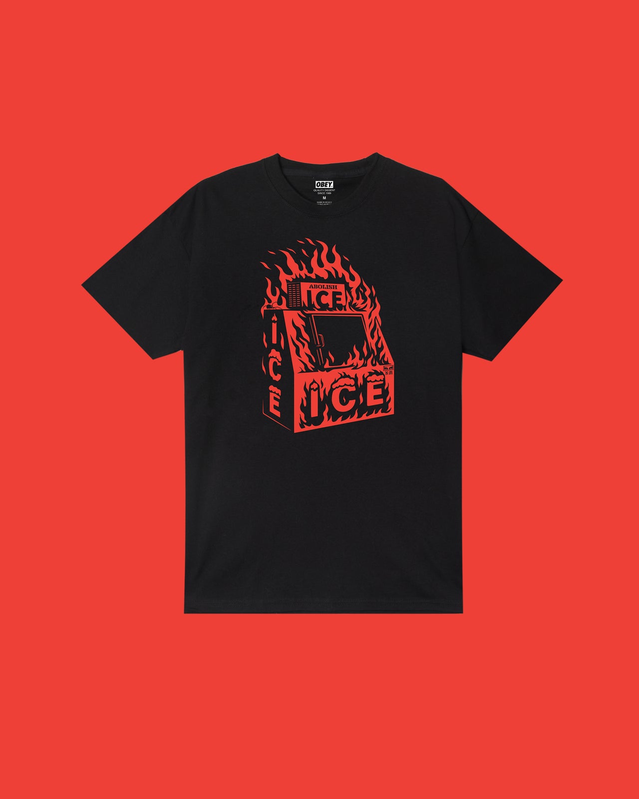 Black t-shirt with red graphic design on a red background