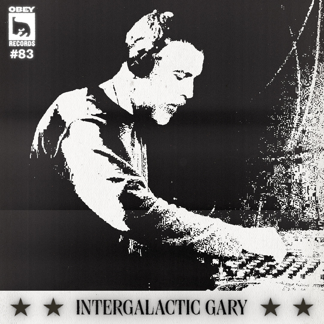 Black and white image of a man with headphones DJ'ing